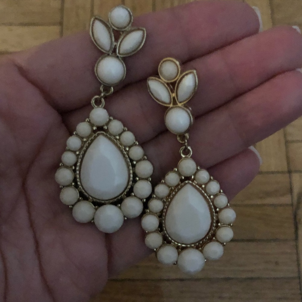 White and gold earrings